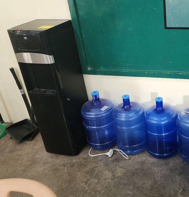 Water dispenser with water bottles